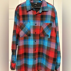 Mens North Face insulated flannel shirt with snap buttons.